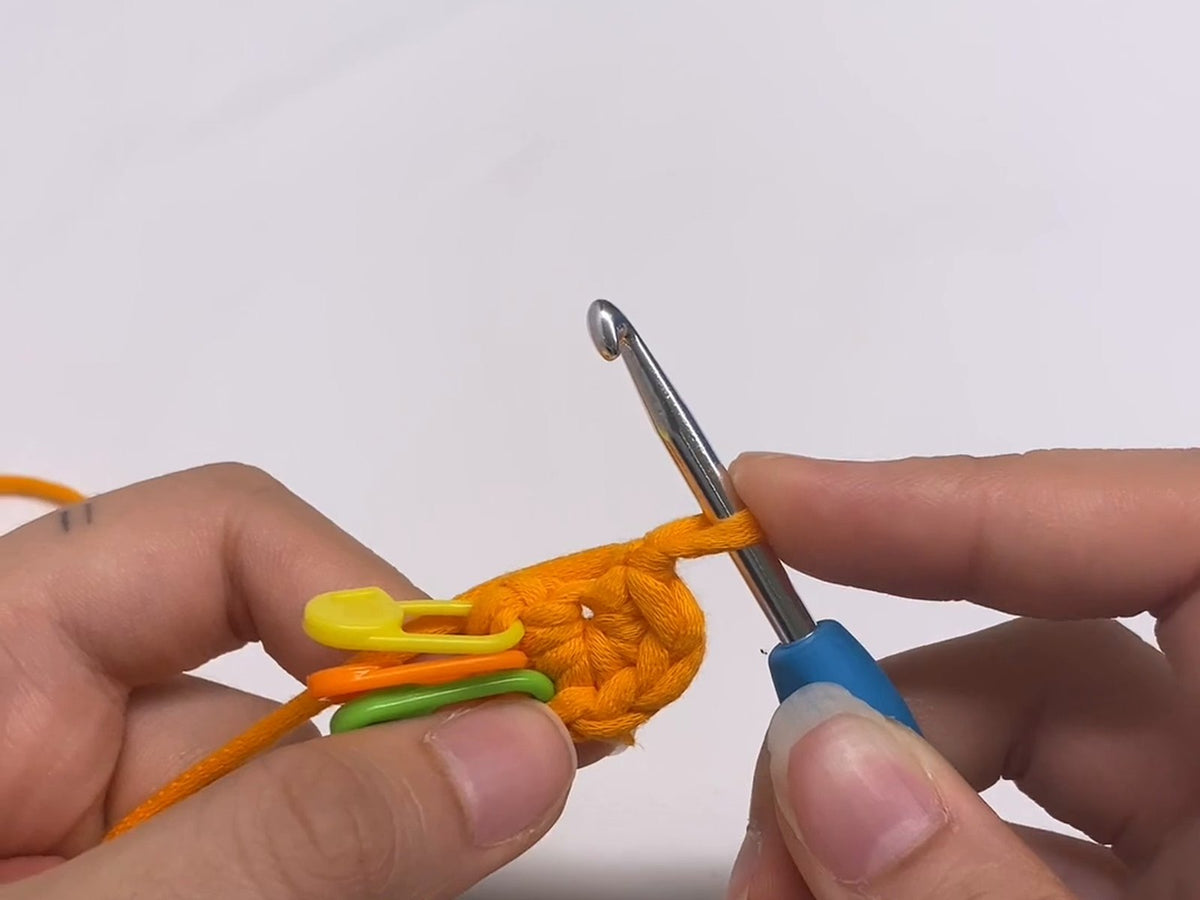 A relaxed grip on a soft-handled ergonomic crochet hook