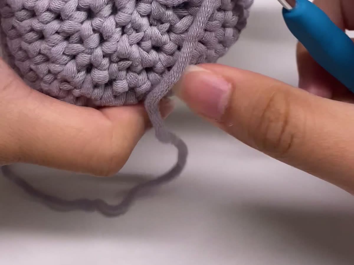 Closing the final rounds of an amigurumi piece with decreases
