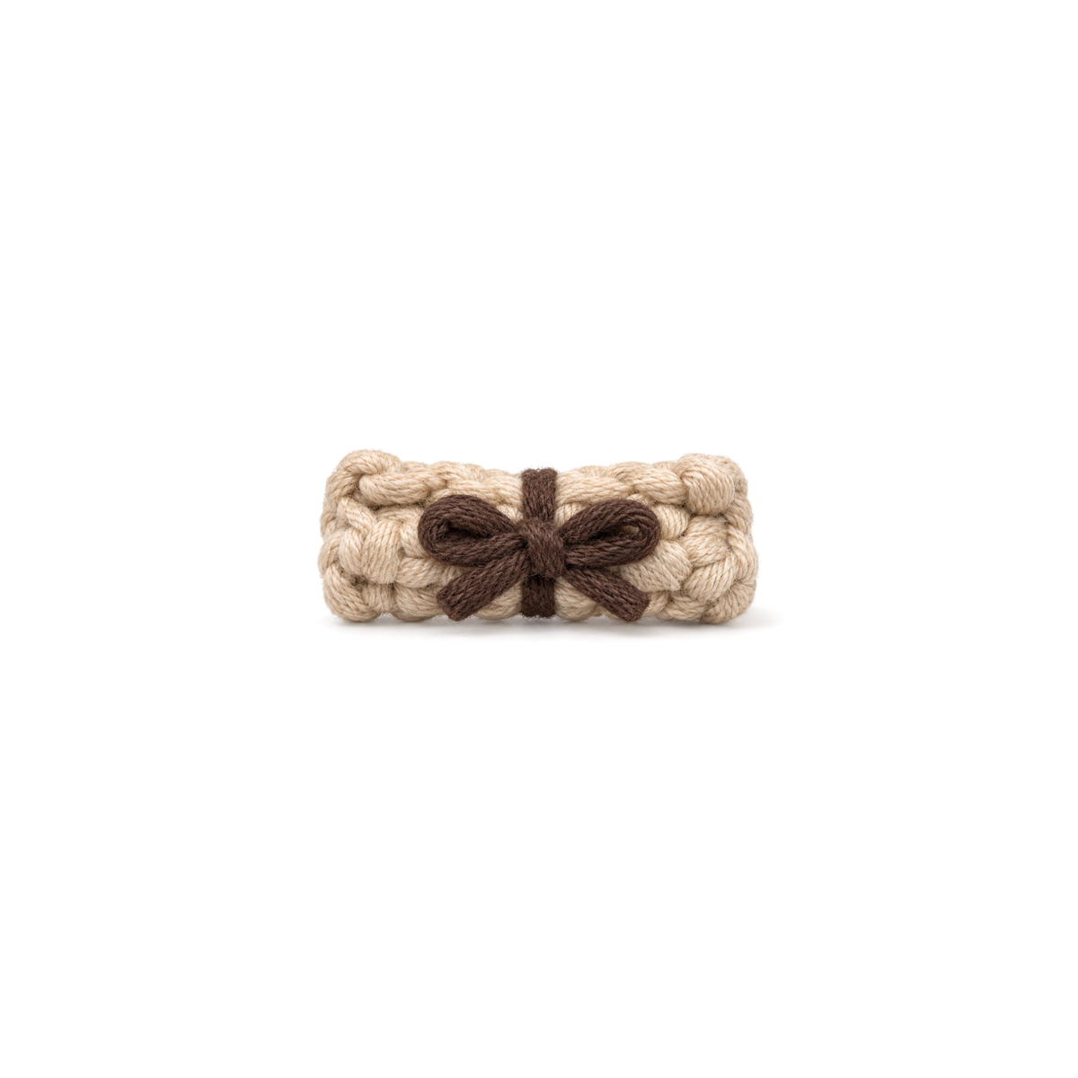 Rolled crochet treasure map tied with a bow