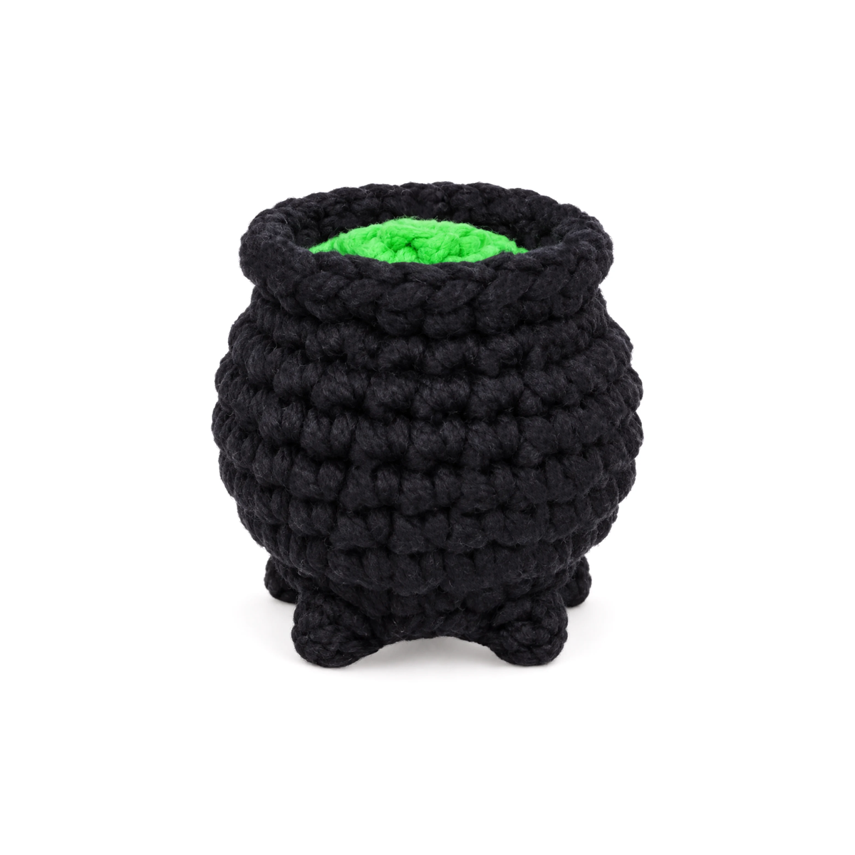 Black crochet cauldron with a green brew inside