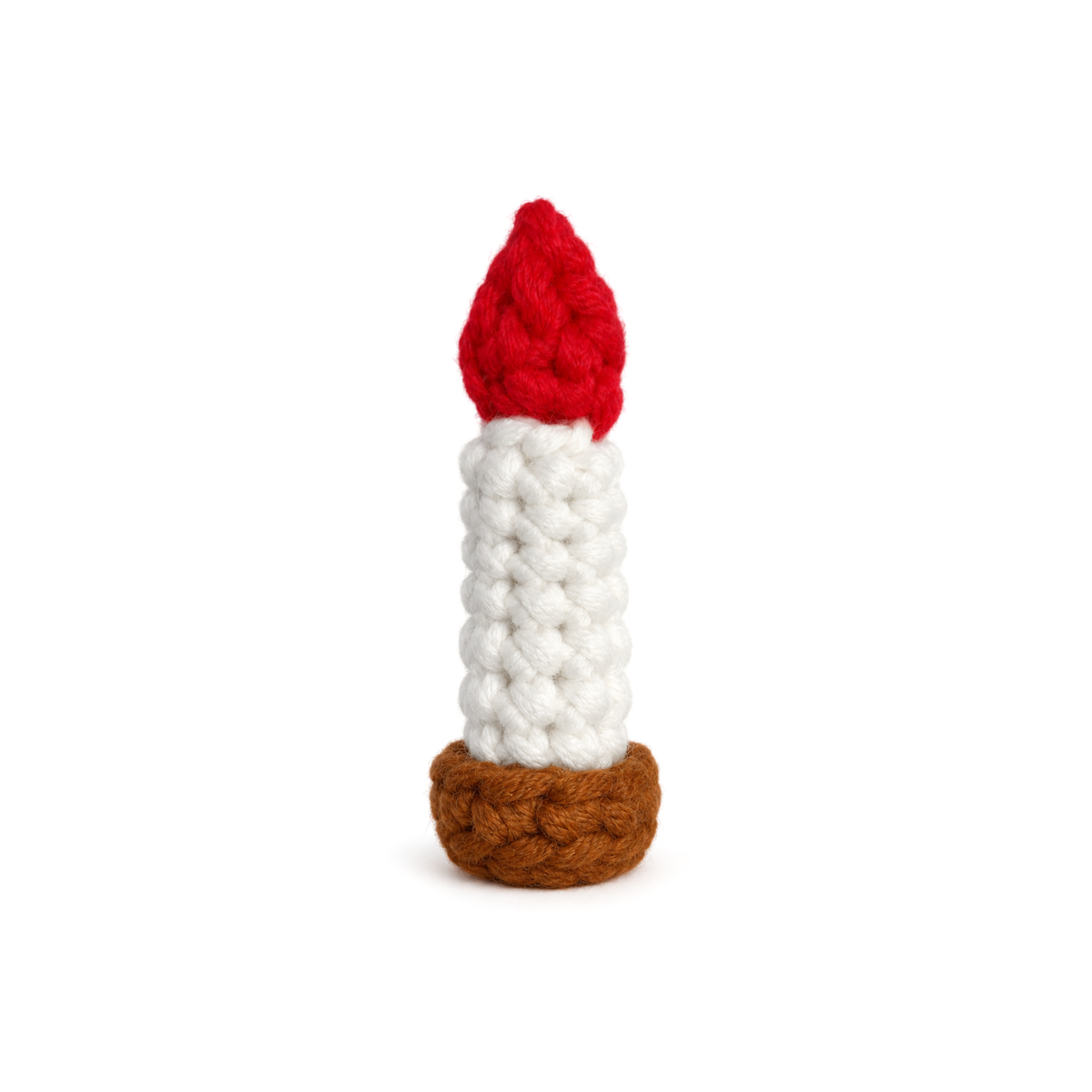 White crochet candle with a red flame in a brown holder